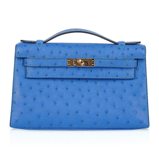 Vivid Cobalt Blue Dotted Embossed Slim Elongated Rectangular Clutch With Gleaming Golden Twist Lock Hardware And Slender Top Handle